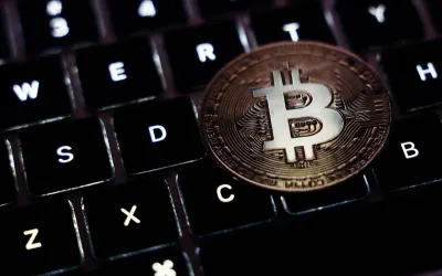 Declinul bitcoin-ului ar putea afecta bursele globale