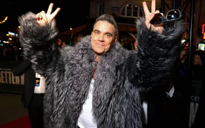 Robbie Williams redescoperă bătăliile neconvenționale ale boyband-urilor