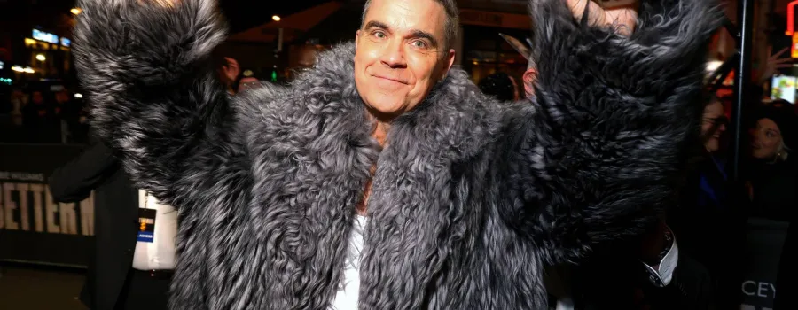 Robbie Williams redescoperă bătăliile neconvenționale ale boyband-urilor