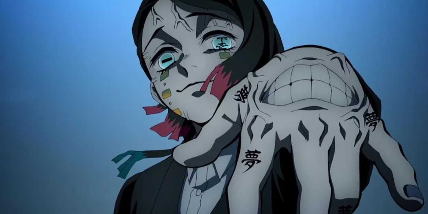 Enmu staring down at the camera while flexing his blood art demon slayer