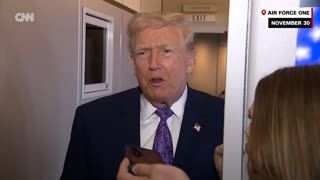 Donald Trump vorbind cu presa pe Air Force One